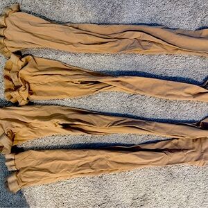 Body wrappers (DANCE)nude footless tights.